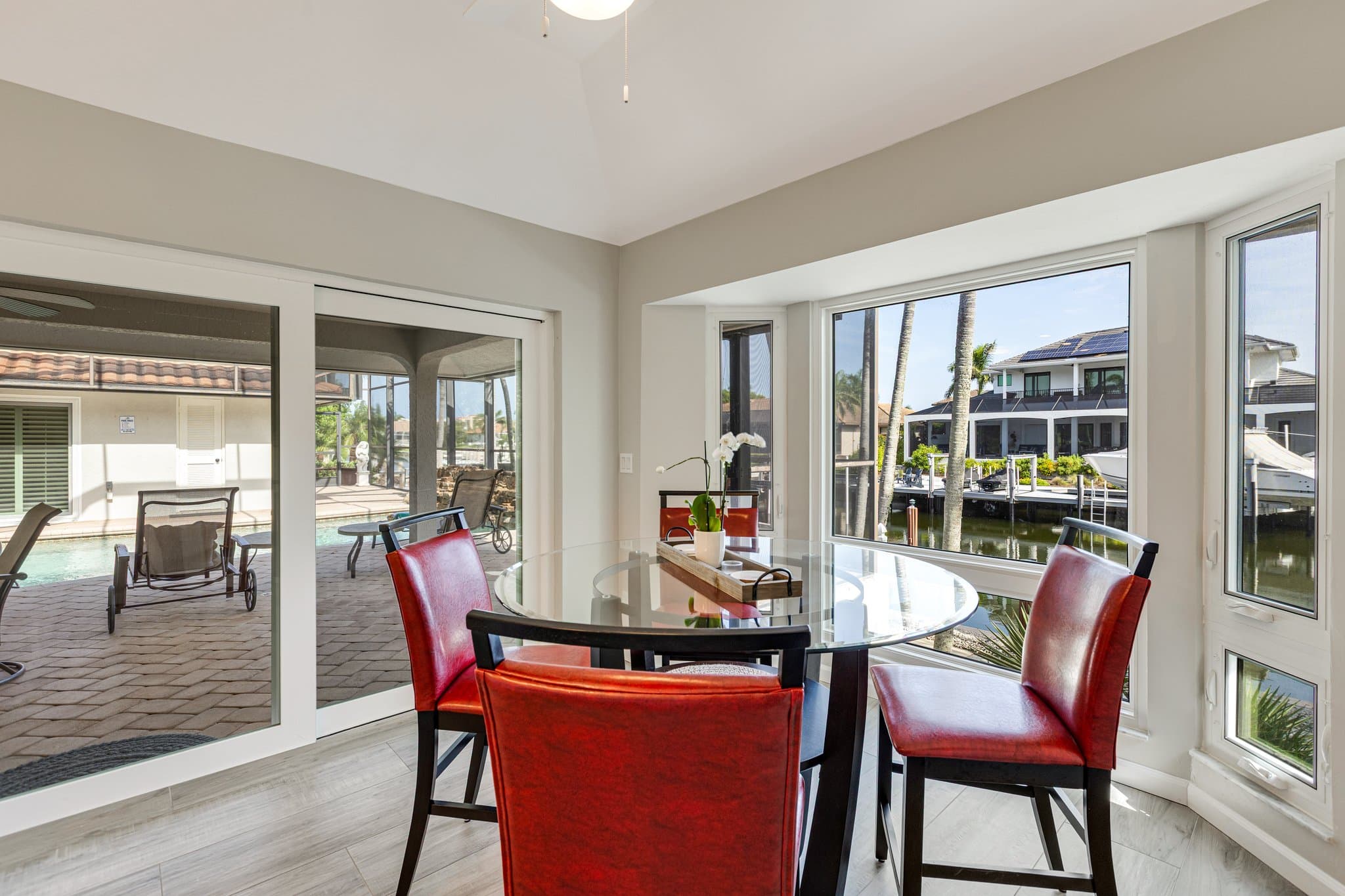 Casual dining nook beside the sliding doors to the pool
