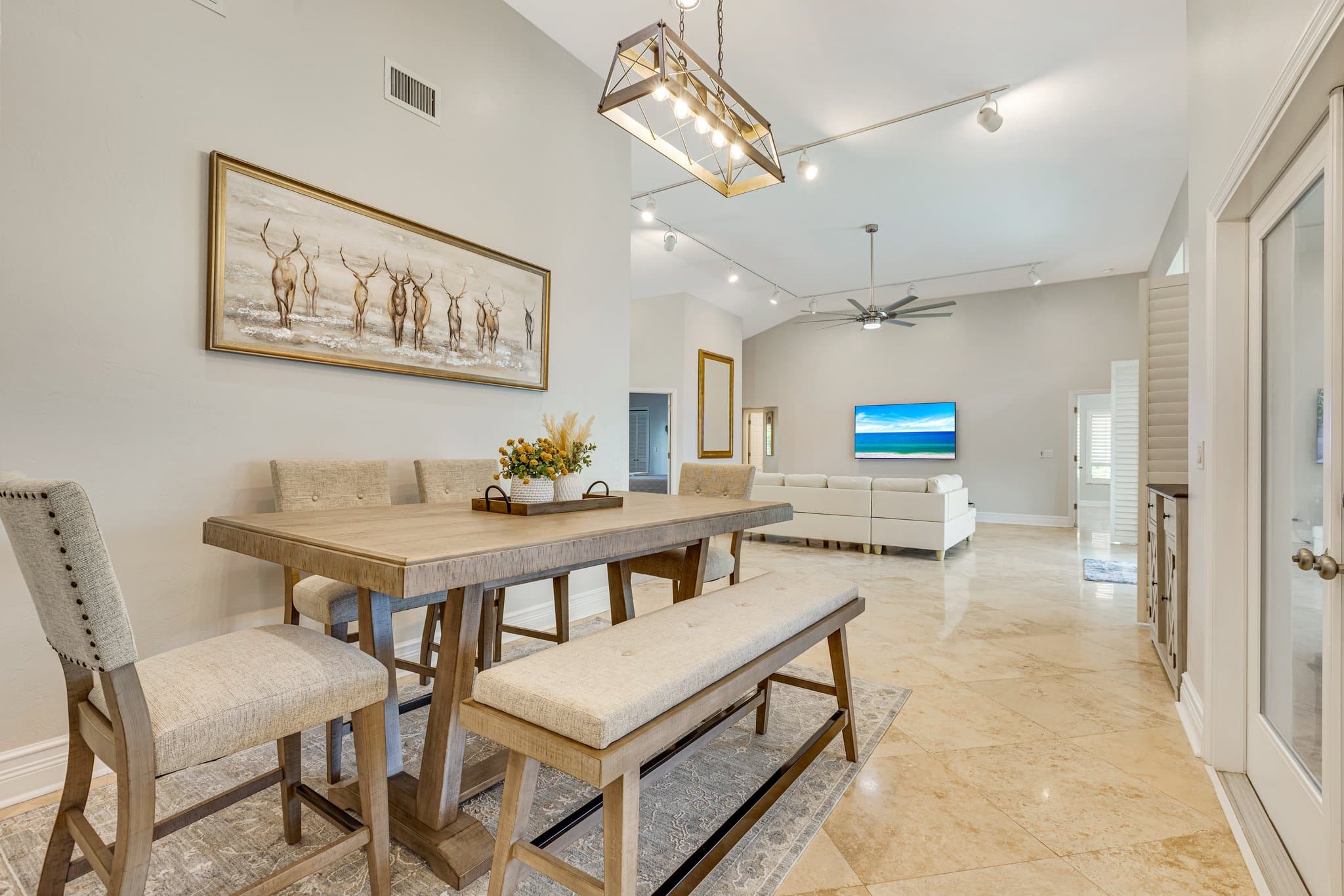 Formal dining table seating six, open to the living room